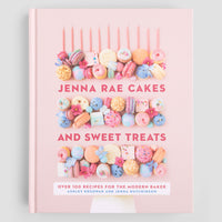 The Jenna Rae Cakes and Sweet Treats Cookbook by Jenna Rae Cakes showcases colorful macarons, cookies, and candies on its pink cover, with over 100 recipes for the modern baker by Ashley Kosowan and Jenna Hutchinson.