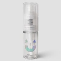 A set of 6 clear plastic Dazzle Dust Pump and Funnel bottles by Jenna Rae Cakes, each with a pump top and holographic smiley face with two stars, shown on a plain light gray background.