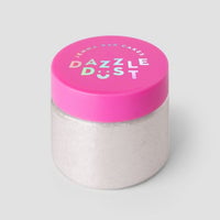A clear container with a bright pink lid labeled Jenna Rae Cakes sits against a light gray background, filled with Diamond Edible Glitter—a fine, shimmery white powder—sold in 20g containers, package of 3.