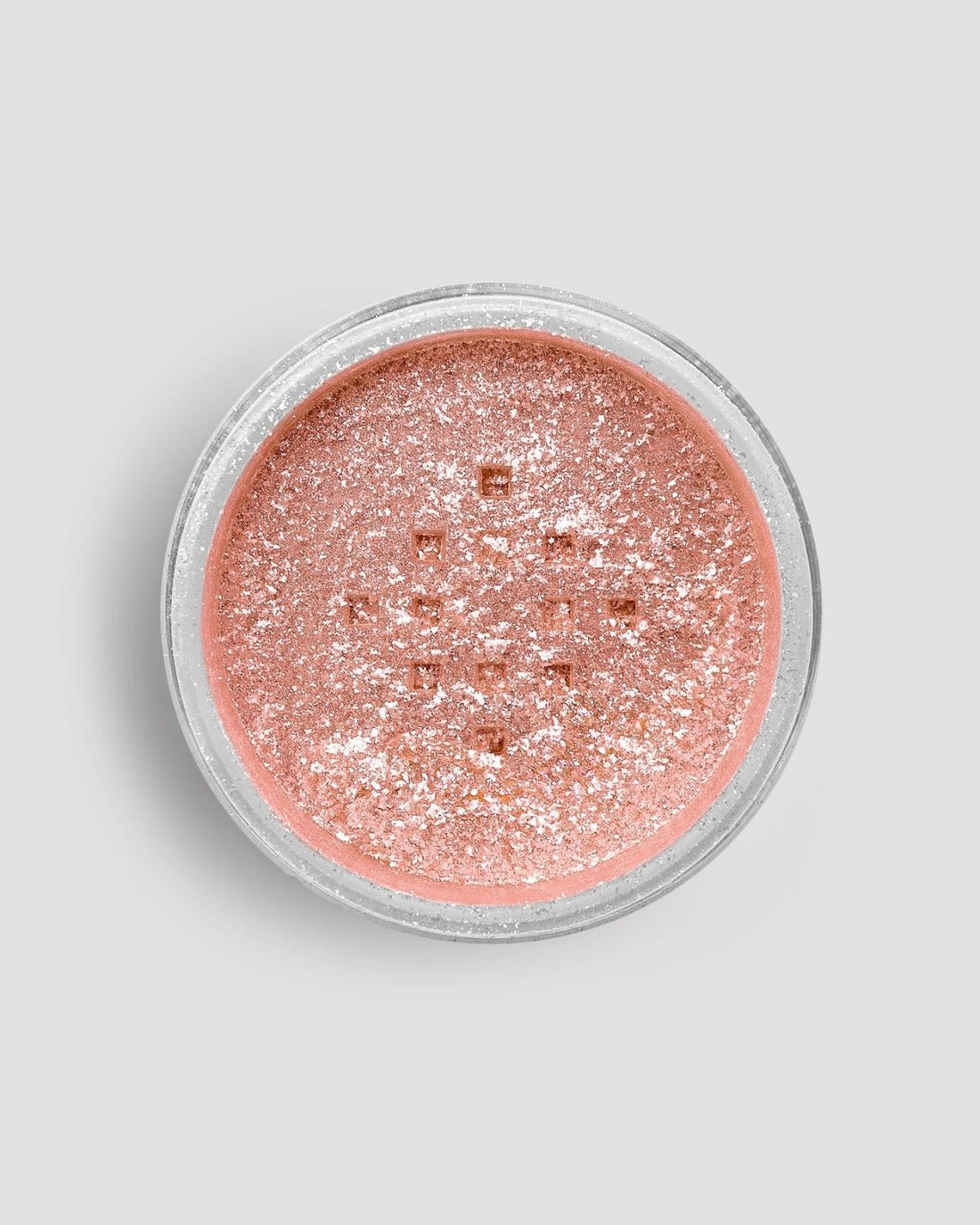 A round shaker of Jenna Rae Cakes Lucky Penny Edible Glitter (5g), with shimmery rose gold powder, viewed from above against a light gray background. Sold as a package of 6.
