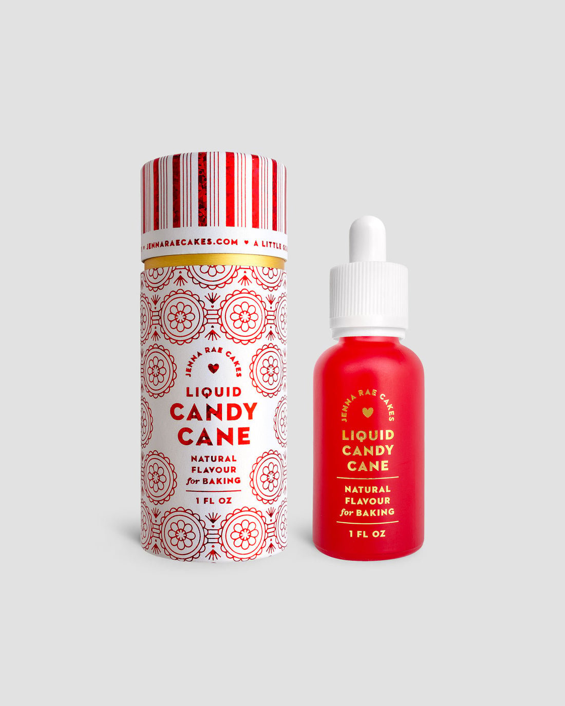 A red dropper bottle and cylindrical box labeled Jenna Rae Cakes Liquid Candy Cane, featuring white and red decorative patterns for baking, are shown against a plain gray background.