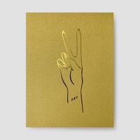 The Jenna Rae Cakes Peace Greeting Card features a minimalist line drawing of a hand making a peace sign, outlined in black and gold on a gold square background, with the number 088 near the wrist.