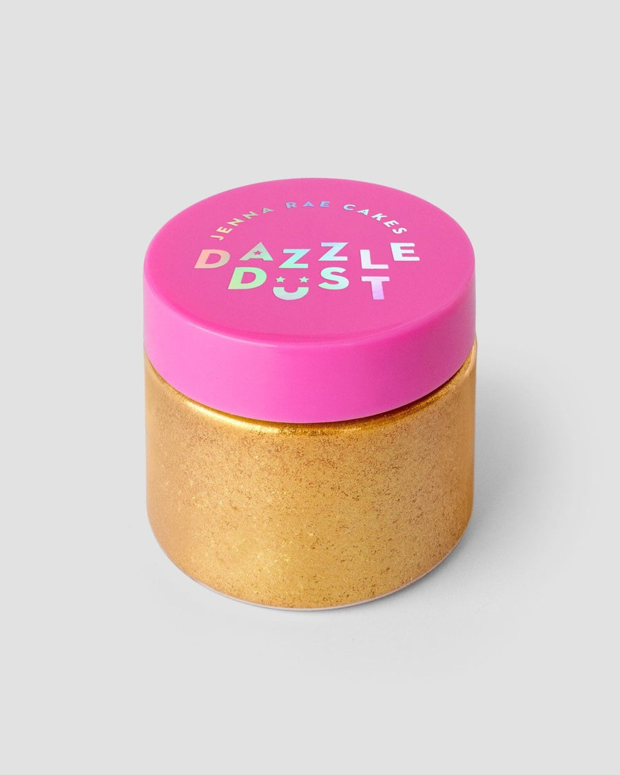 A set of three 20g containers of Jenna Rae Cakes’ 24k Magic Edible Glitter, each small jar with shiny gold powder and a bright pink lid, shown against a plain light gray background.