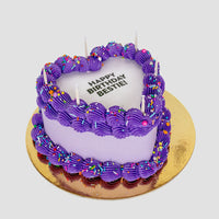 Design This Cake: Cake Size: Short | Burn Away Text: Happy Birthday Bestie! | Cake Colour: Lavender | Piping Style: Simple | Piping Colour: Purple | Add White Candles