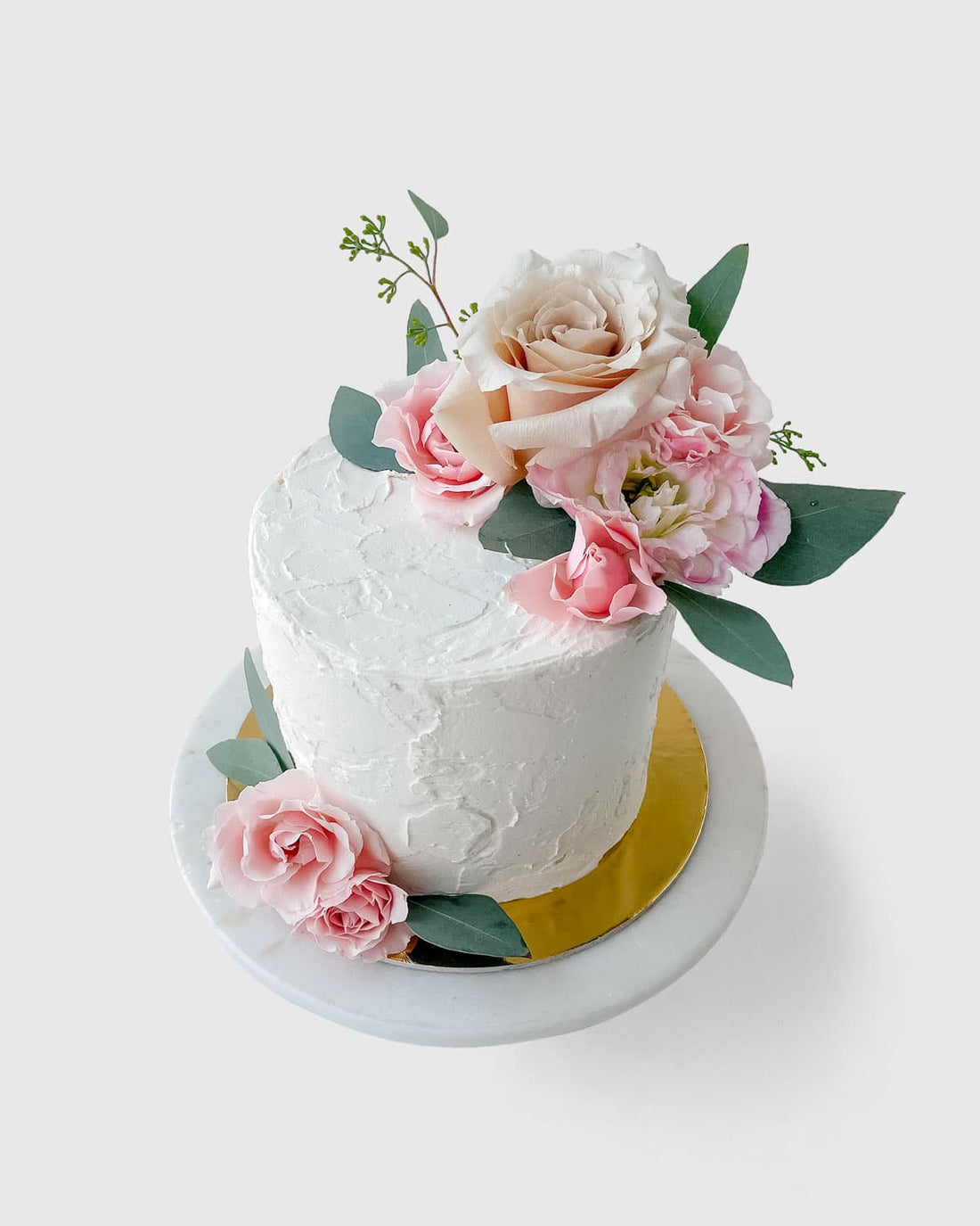 Bright Festive White Cake With Bright Flowers Made Of Cream A Wedding Cake  For A Woman Stock Photo - Download Image Now - iStock