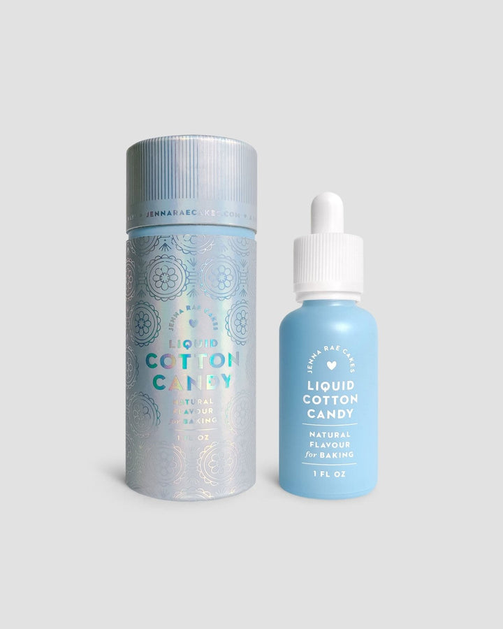 A blue and white dropper bottle labeled “Liquid Cotton Candy” from Jenna Rae Cakes stands beside a matching cylindrical container on a light gray background.
